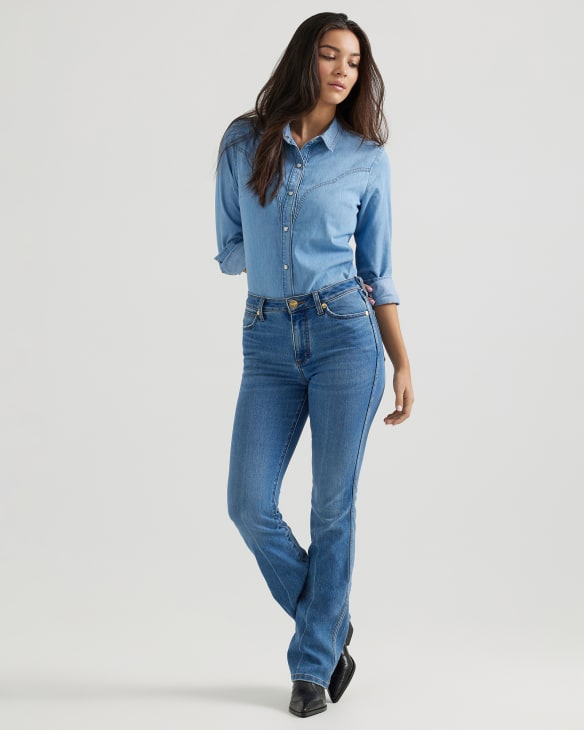 Wrangler® x Yellow Rose by Kendra Scott Mid Rise Boot Cut in Wrangler Wreal Medium Blue